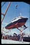 hoisted on crane